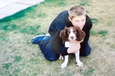 Small photo of Alex with one of his cats